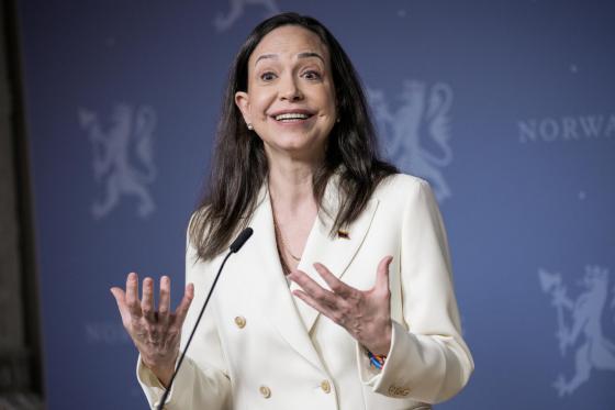 Nobel Peace Prize laureate Maria Corina Machado (L) speaks during a press conference with Norway's Prime Minister Jonas Gahr Store (not pictured) at the government's representative facilities in Oslo, Norway, 11 December 2025.